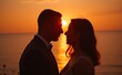 © Creuxnoir - Silhouette of a couple kissing at sunset