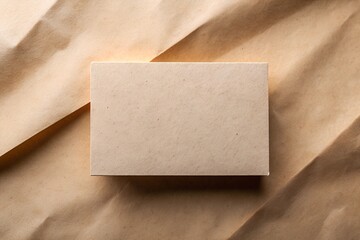 Wall Mural - Mock-up of empty kraft paper, business card. Branding presentation. White background. Close-up.