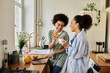 © LIGHTFIELD STUDIOS - A caring couple shares laughter while preparing food at home.