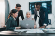 © chokniti - Successful Business Team in Office Cooperation, Professional Partnership Communication Highlighted as Colleagues Shake Hands and Collaborate, Teamwork Group Success in Corporate Setting