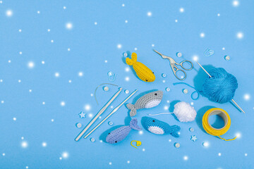 Wall Mural - Set of clew of thread for knitting. Crocheted different fishes, handmade, sea hobby concept