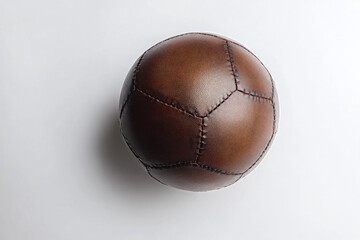 Wall Mural - Ultra-Realistic UHD Photo of a Football on White Background  