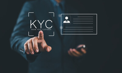 Leinwandbilder - Know your customer concept. Business verifying the identity of clients for KYC financial client authentication. Personal information for identification. Person holding KYC card icon on virtual screen.