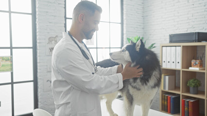 Canvas Print - Hispanic veterinarian examining friendly husky in a bright clinic