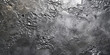 © AI_images - A silver textured surface with a rugged, pitted texture, giving the appearance of weathered metal with a rich, aged patina.