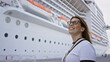 © Krakenimages.com - Smiling woman on luxury cruise vacation at sea