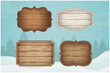 © switchpipi - Realistic wooden signs set. Christmas decorations and design elements. Vector illustration