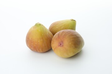 Many fresh ripe figs on white background