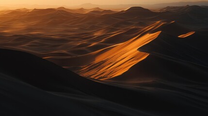 Wall Mural - A stunning landscape at sunset, showcasing undulating sand dunes illuminated by golden light.