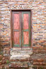 old brick wall with window