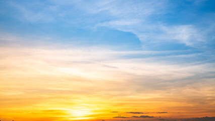 Wall Mural - beautiful , luxury soft gradient orange gold clouds and sunlight on the blue sky perfect for the bac