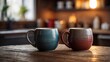 © Ta Sher - Two mugs on rustic wooden table in cozy kitchen.
