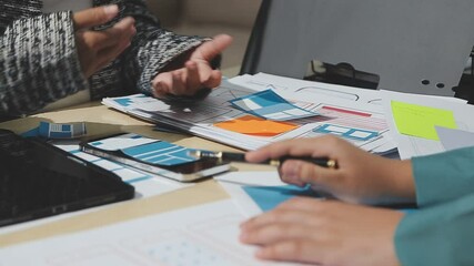 The designer team is designing the uxui system to make the uxui system work well on new phones and support system updates. Website development concept UI UX front end designer