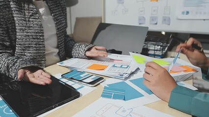 The designer team is designing the uxui system to make the uxui system work well on new phones and support system updates. Website development concept UI UX front end designer