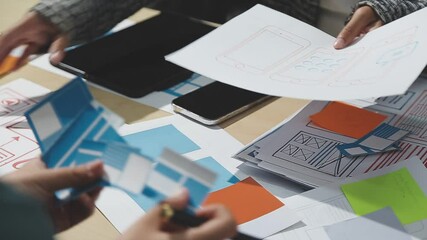 The designer team is designing the uxui system to make the uxui system work well on new phones and support system updates. Website development concept UI UX front end designer