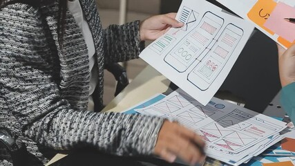 The designer team is designing the uxui system to make the uxui system work well on new phones and support system updates. Website development concept UI UX front end designer