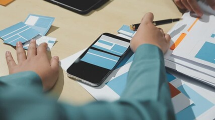 The designer team is designing the uxui system to make the uxui system work well on new phones and support system updates. Website development concept UI UX front end designer