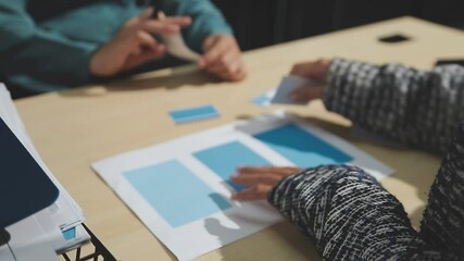 The designer team is designing the uxui system to make the uxui system work well on new phones and support system updates. Website development concept UI UX front end designer