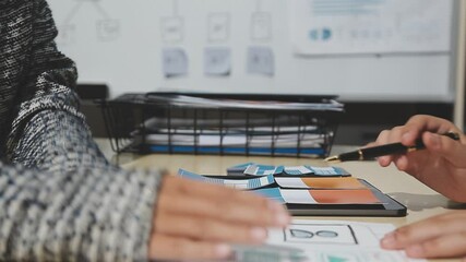 The designer team is designing the uxui system to make the uxui system work well on new phones and support system updates. Website development concept UI UX front end designer