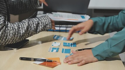 The designer team is designing the uxui system to make the uxui system work well on new phones and support system updates. Website development concept UI UX front end designer
