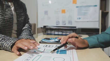 The designer team is designing the uxui system to make the uxui system work well on new phones and support system updates. Website development concept UI UX front end designer