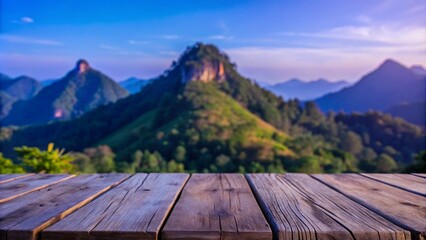 Vintage wooden top with blurred mountain, green forest, and blue sky background in a realistic photo