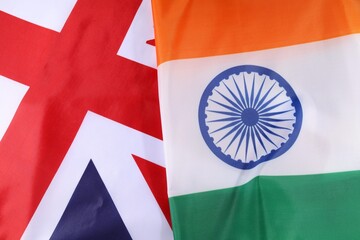 Flags of India and the United Kingdom displayed together at an event