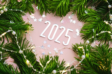 Wall Mural - new year 2025 pink background. number of the coming year in christmas decoration.