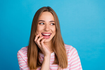 Poster - Photo of lovely cute cheerful woman wear stylish pink clothes look empty space banner isolated on blue color background