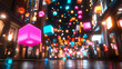 © jayasankar - Floating colorful cubes illuminate a vibrant city street at night creating a dreamy atmosphere for passersby