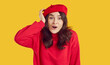 © Studio Romantic - Photo of beautiful impressed young woman touching her head. Surprised brunette girl in red beret and sweatshirt staring at camera with open mouth over isolated on yellow background
