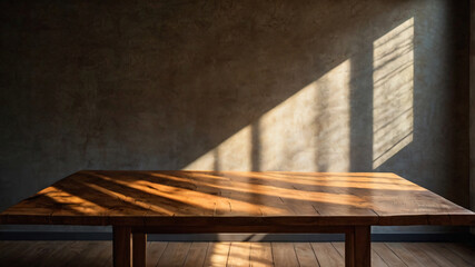 Wall Mural - empty dark wooden table with abstract light from leaf shadow on the wall