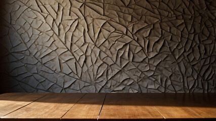 Wall Mural - empty dark wooden table with abstract light from leaf shadow on the wall