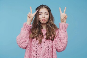 Poster - A person forming a peace sign gesture with her hands