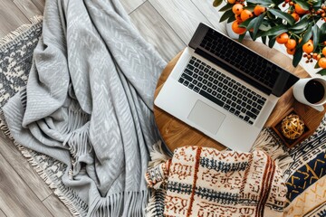 Wall Mural - A laptop computer sitting on a wooden table, ideal for remote work or study