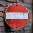 © Andrii - No entry sign on an old brick wall in an urban setting