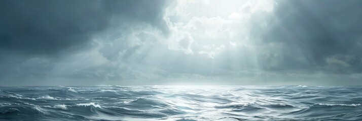 Wall Mural - Sunlight streaming through a cloudy sky over the vast ocean