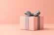© Sekai - Peach Gift Box with a Grey Ribbon on a Peach Background: Subtle and Stylish