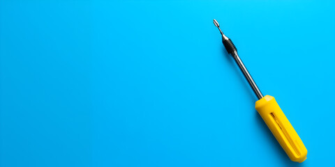 Screwdriver icon web banner. Screwdriver symbol isolated on blue background with copy space for text.