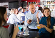 © JackF - Dissatisfied girl refusing colleague courtship at corporate party in bar..
