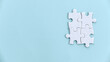 © MohamadFaizal - Four Jigsaw Puzzle Pieces Interlocking: Symbolizing Teamwork and Collaboration