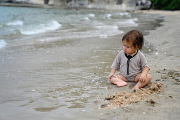 Baby girl on the beach