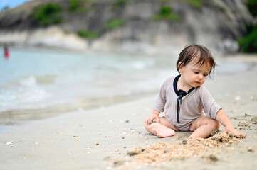 Baby girl on the beach