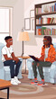 © Colon - Therapy Session Dynamics: African American Teen Discusses Bullying with Family Psychologist