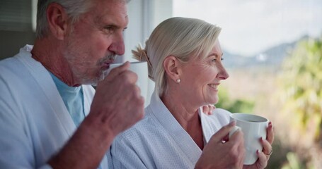 Sticker - Elderly couple, window and morning with coffee for holiday, vacation or view at nature resort. Mature man, woman or lovers enjoying beverage, breakfast drink or sightseeing together at luxury hotel