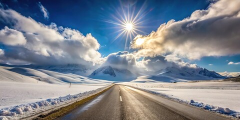 Beautiful winter landscape with snowy road and mountains in Gran Sasso, Italy