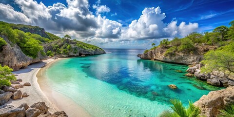 Vibrant turquoise waters lap against the picturesque white sand beach of a secluded cove on the sun-kissed island of Curaçao in the West Indies.