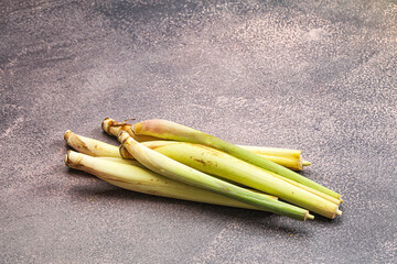 Wall Mural - Green organic lemongrass stem heap