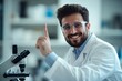 © ChaoticMind - A beaming scientist in safety goggles and lab coat points upward, with a microscope and lab tools visible, showcasing a dynamic and enthusiastic laboratory setting.