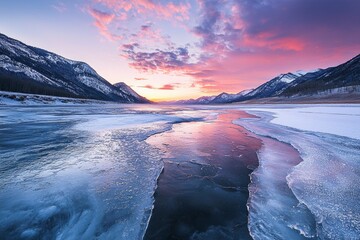 Wall Mural - a half-frozen icy river leading to mountains at the far end